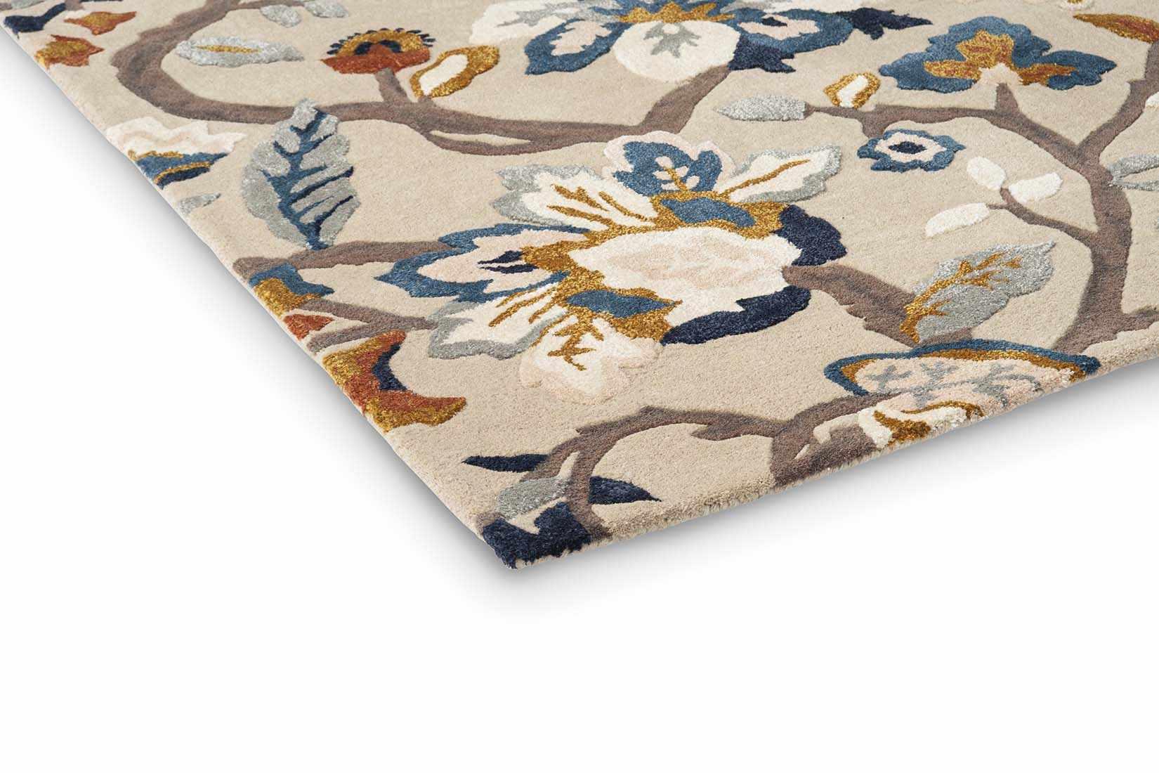 stone coloured wool and viscose rug with multicolour floral design