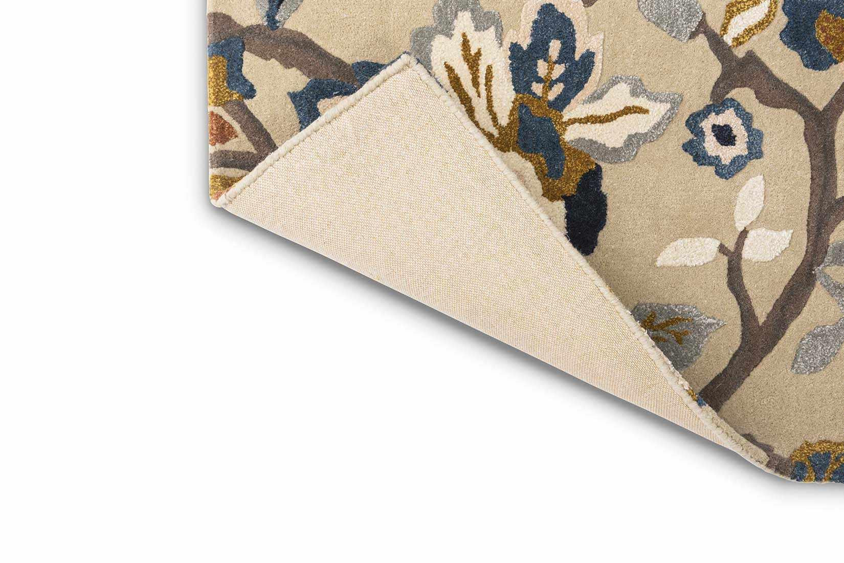 stone coloured wool and viscose rug with multicolour floral design