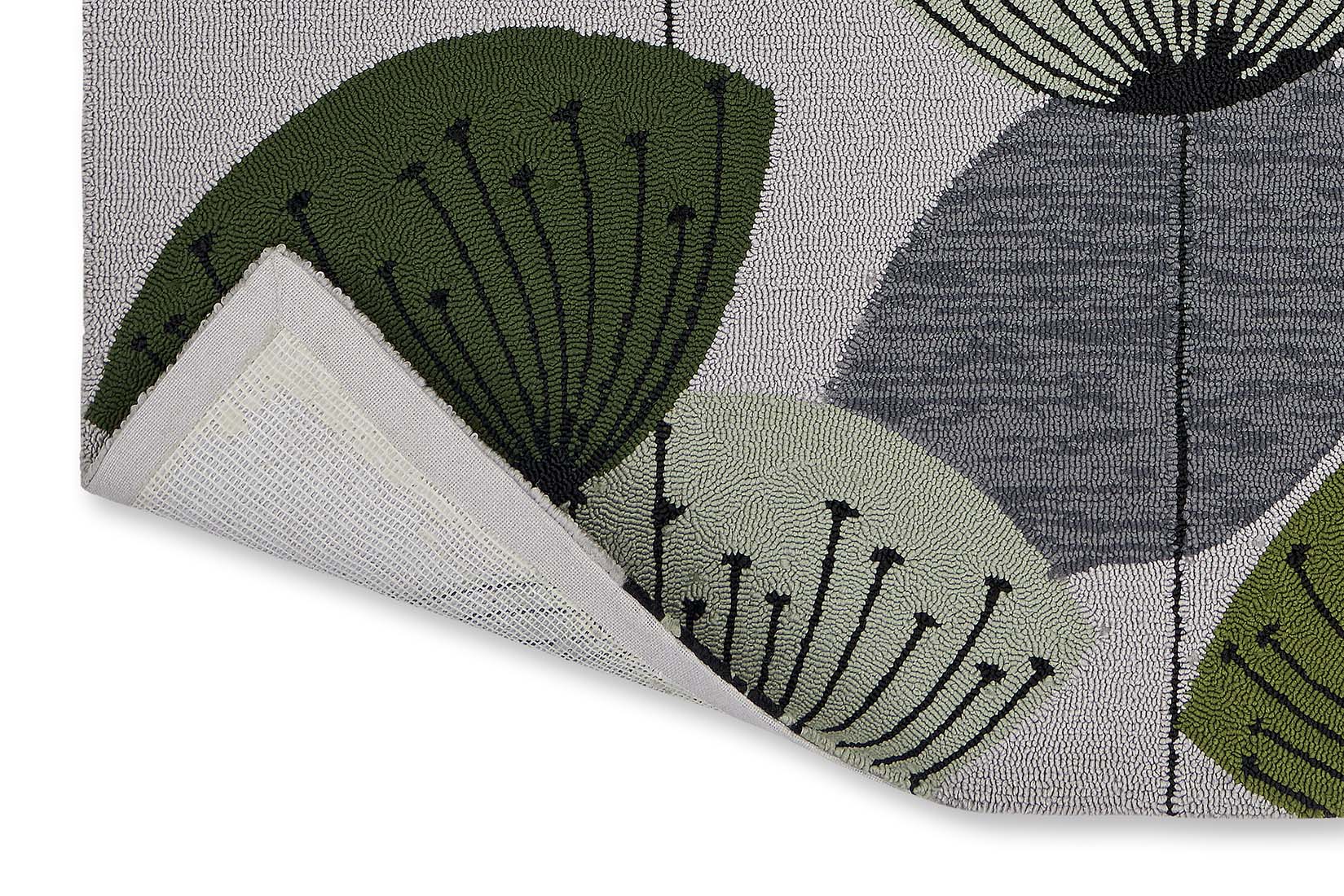 green and grey indoor/outdoor rug with dandelion pattern