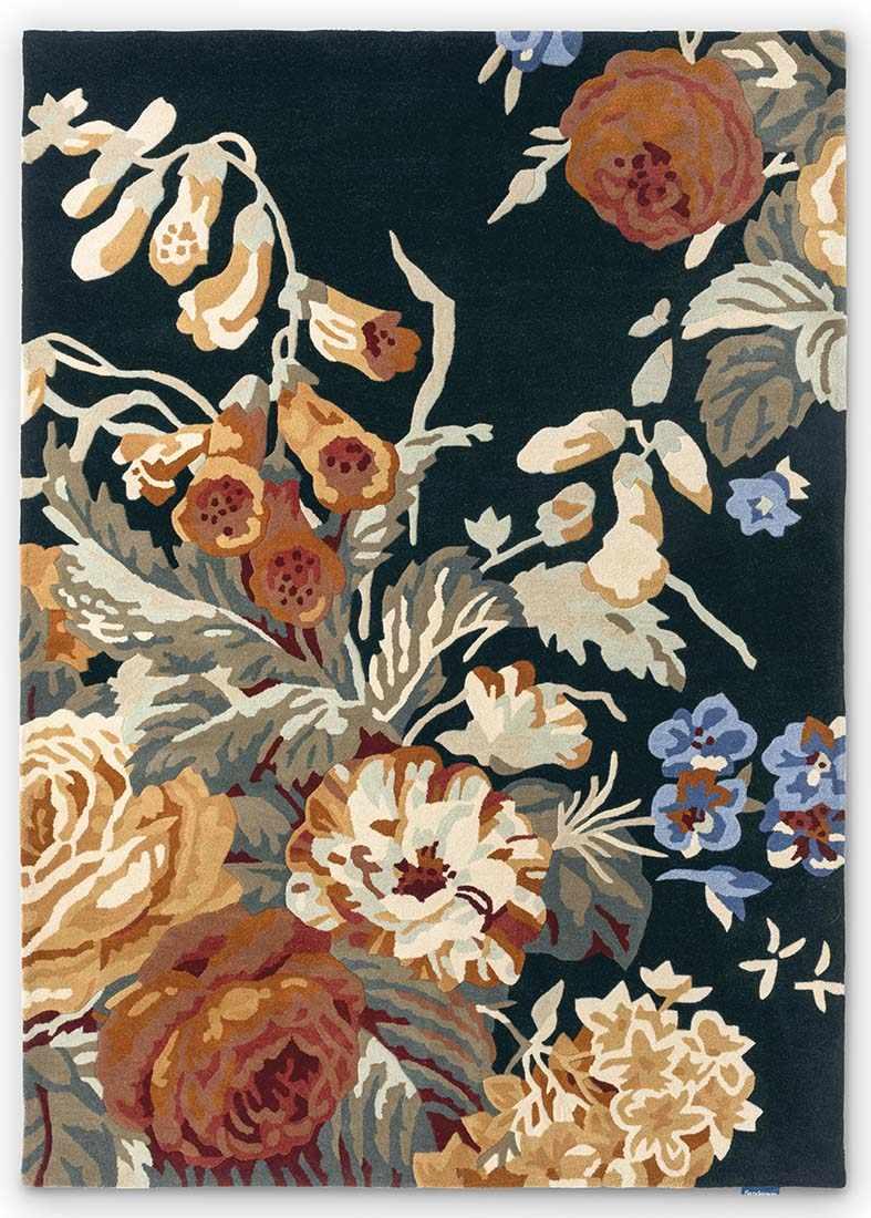 navy wool rug with multicolour floral design