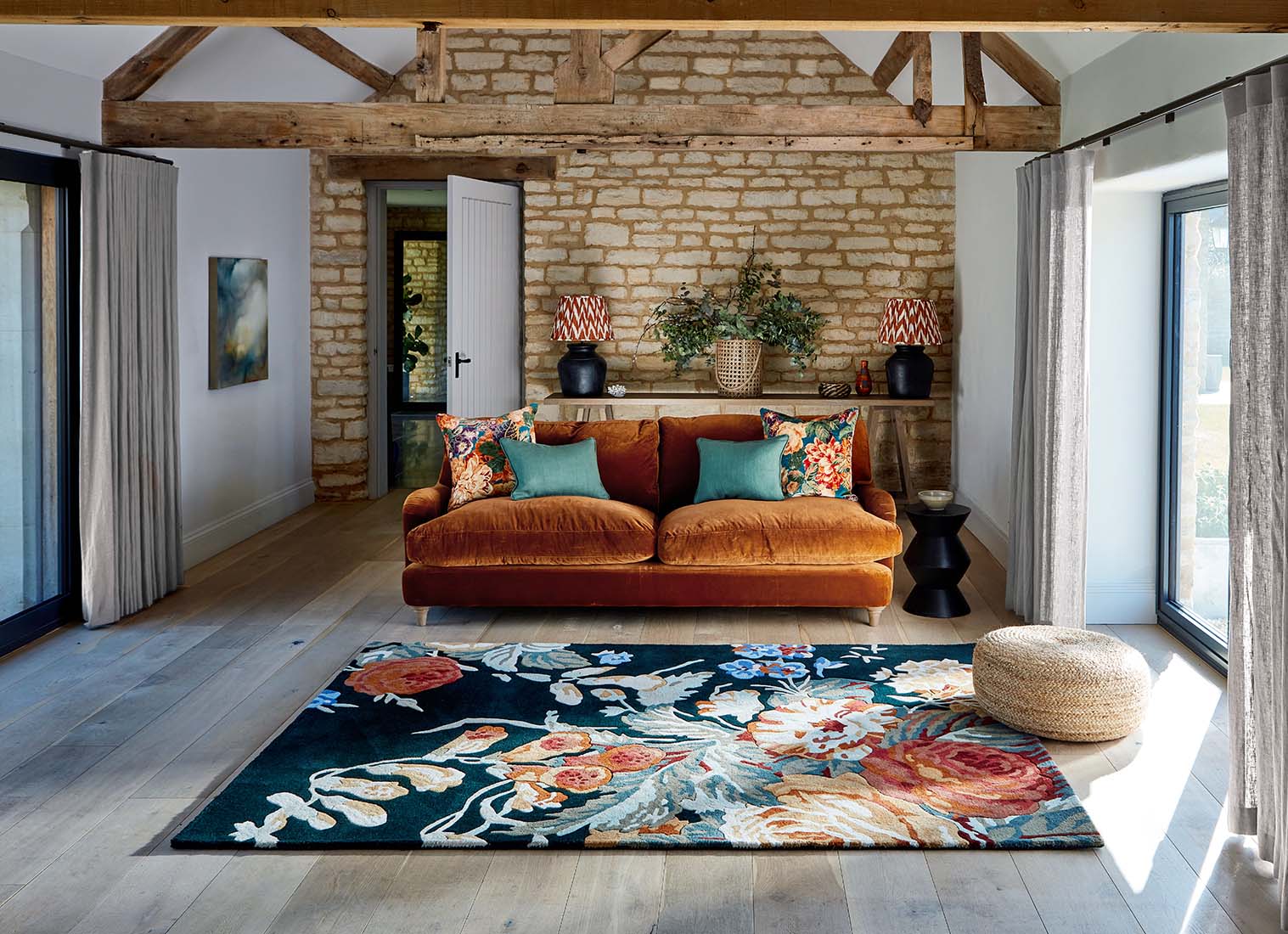 navy wool rug with multicolour floral design