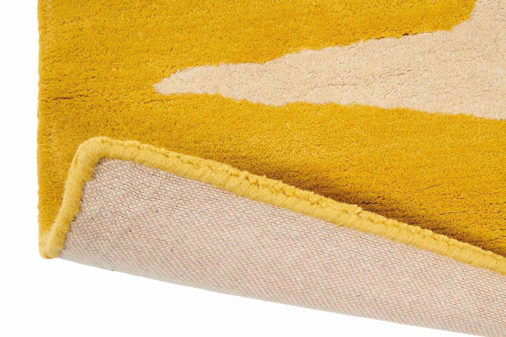 Abstract yellow and cream rug