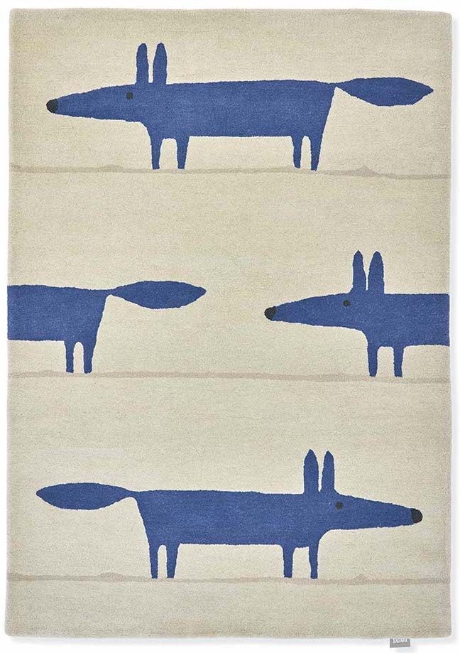 blue and cream rug with fox print 
