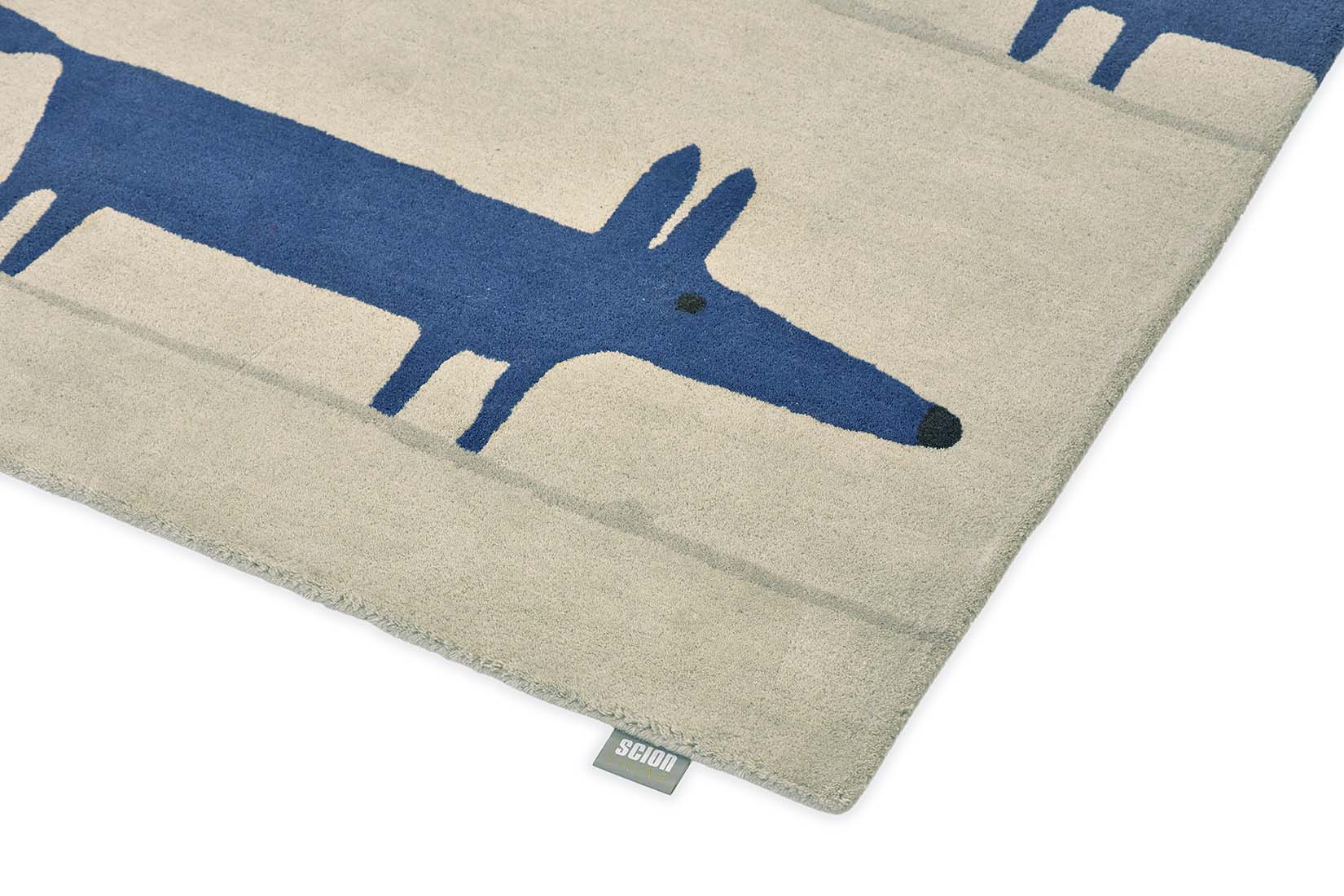 blue and cream rug with fox print 
