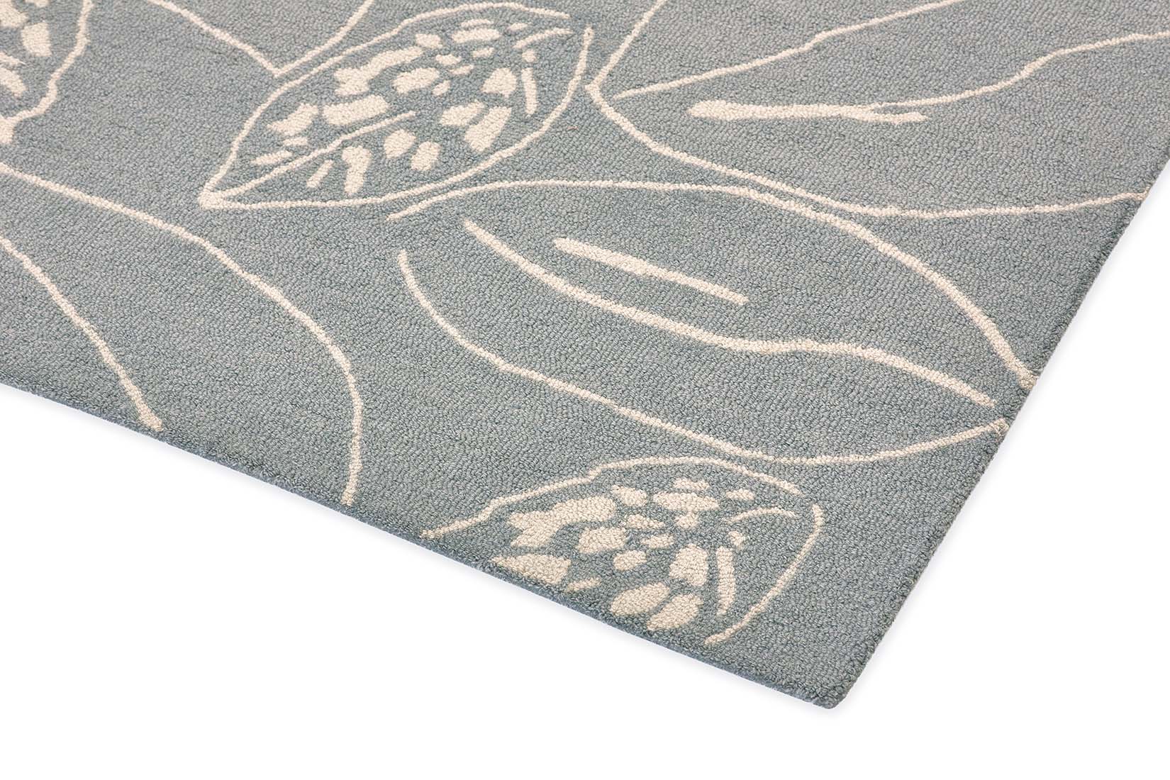 grey rug with floral pattern
