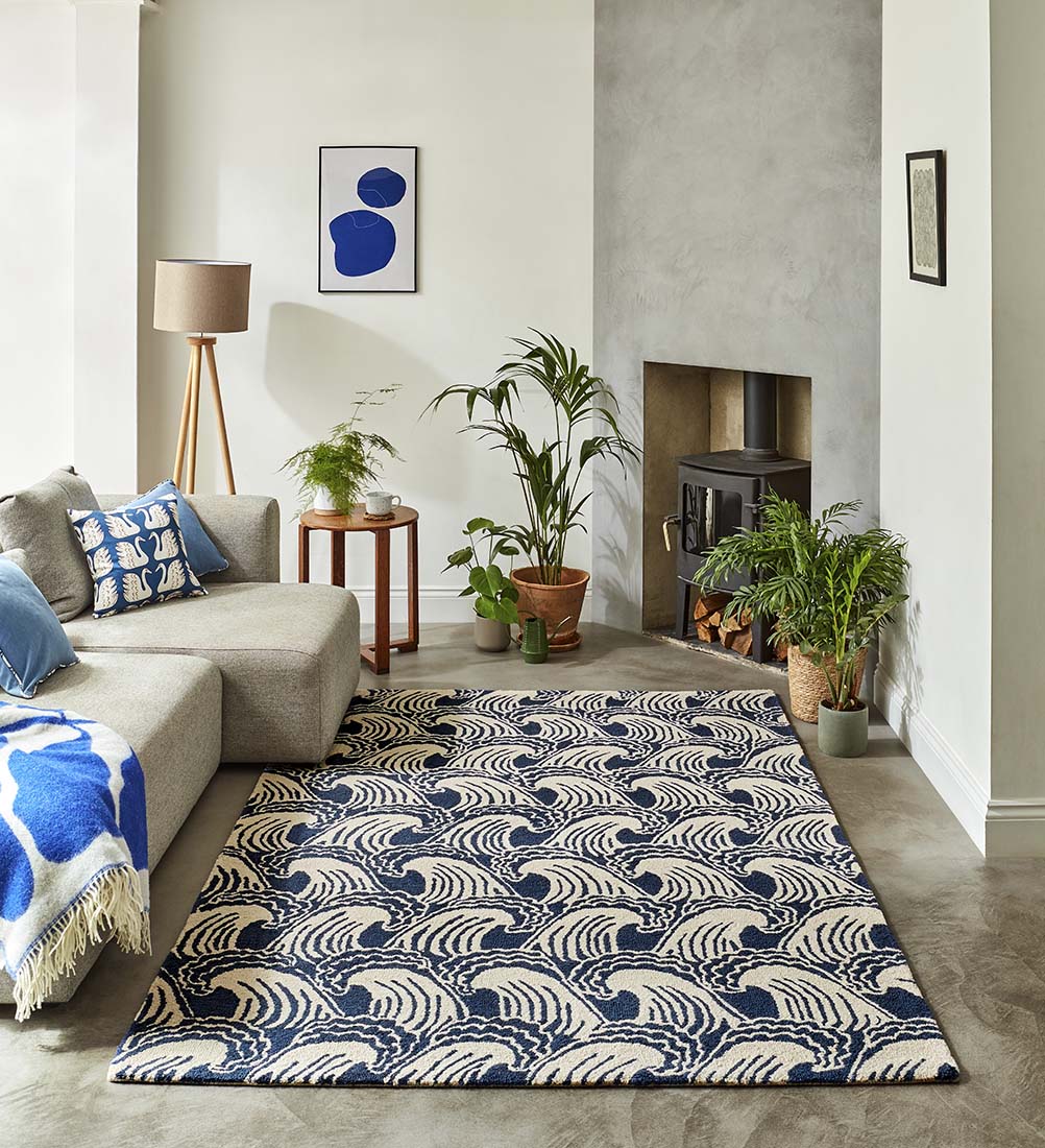 blue and beige rug with wave design
