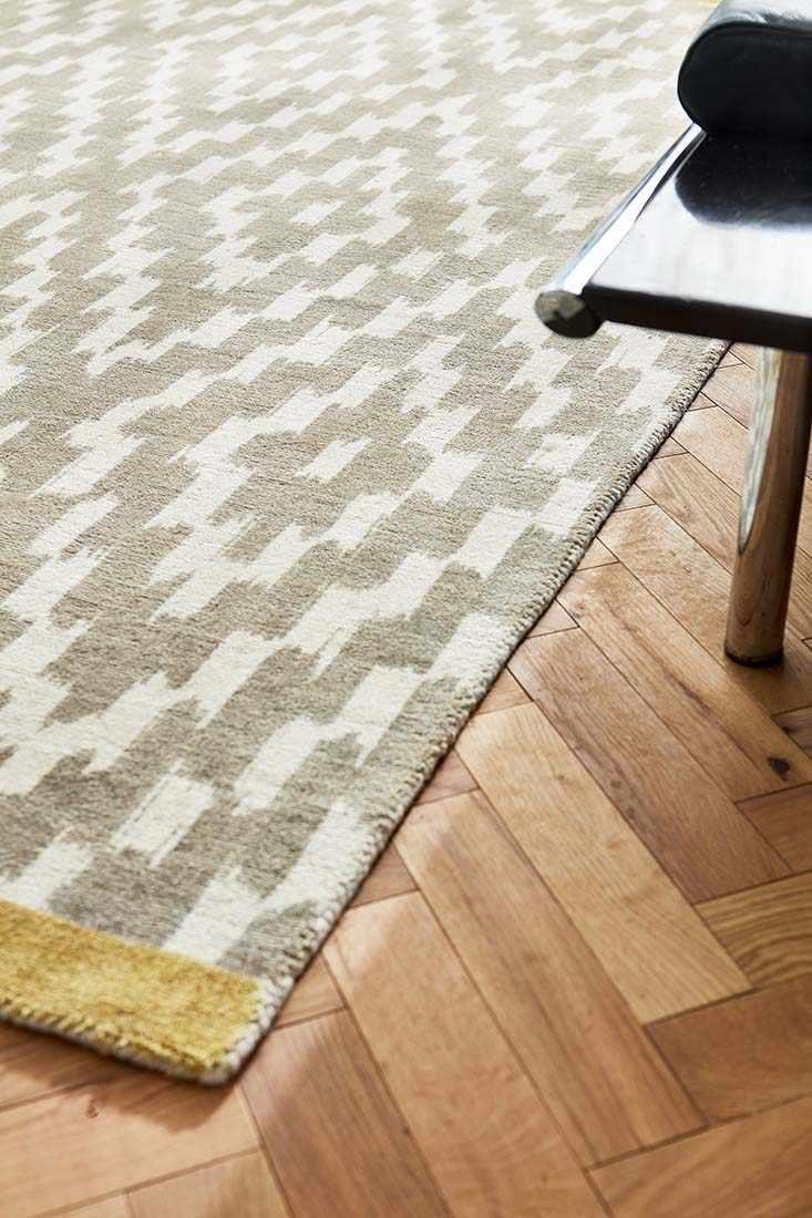 grey wool rug with repeat aztec design