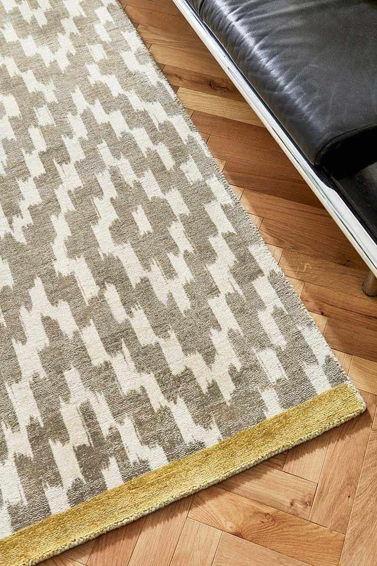 grey wool rug with repeat aztec design