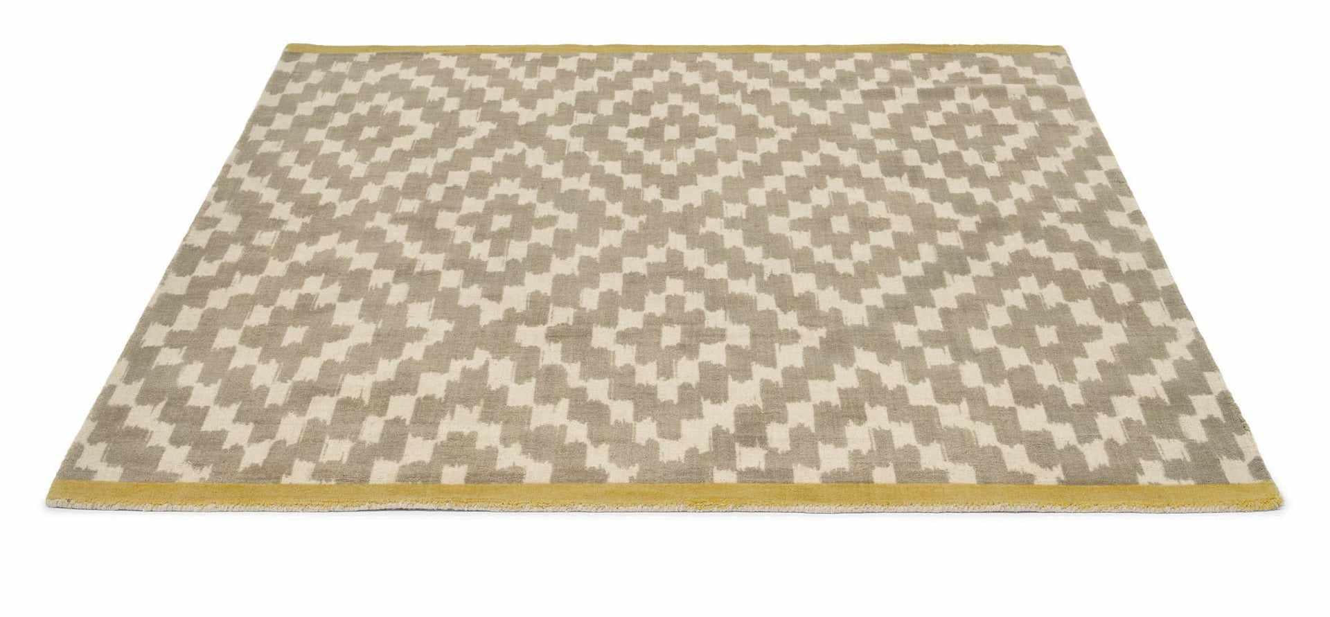 grey wool rug with repeat aztec design