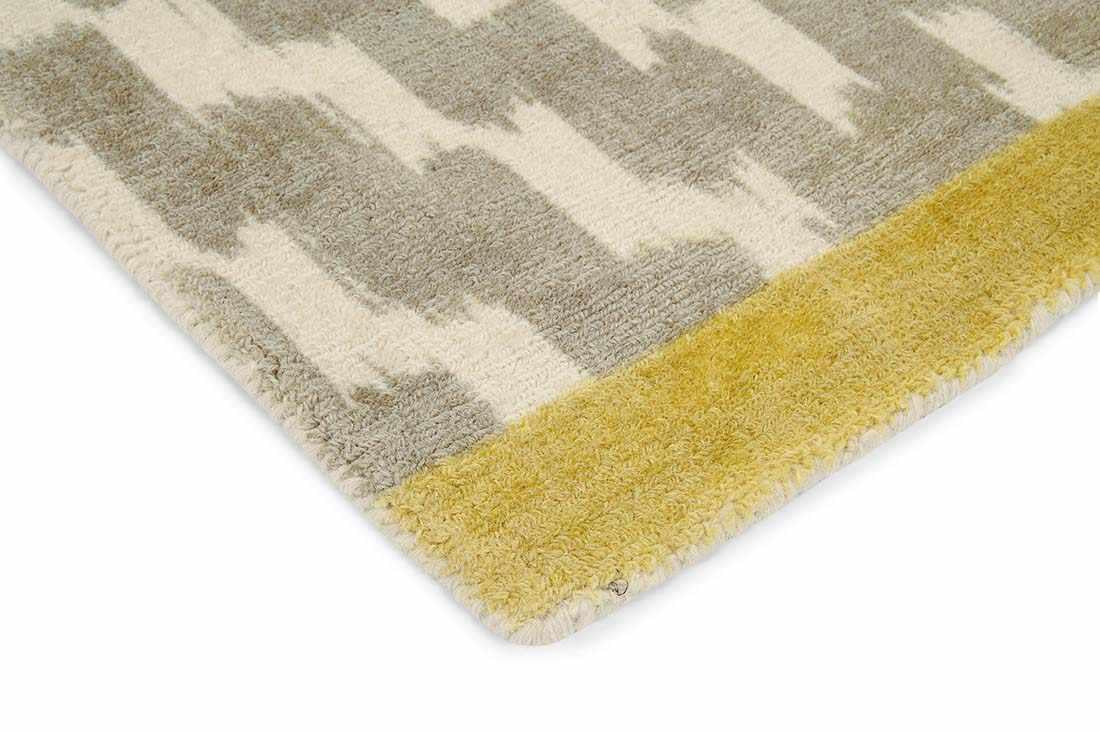 grey wool rug with repeat aztec design