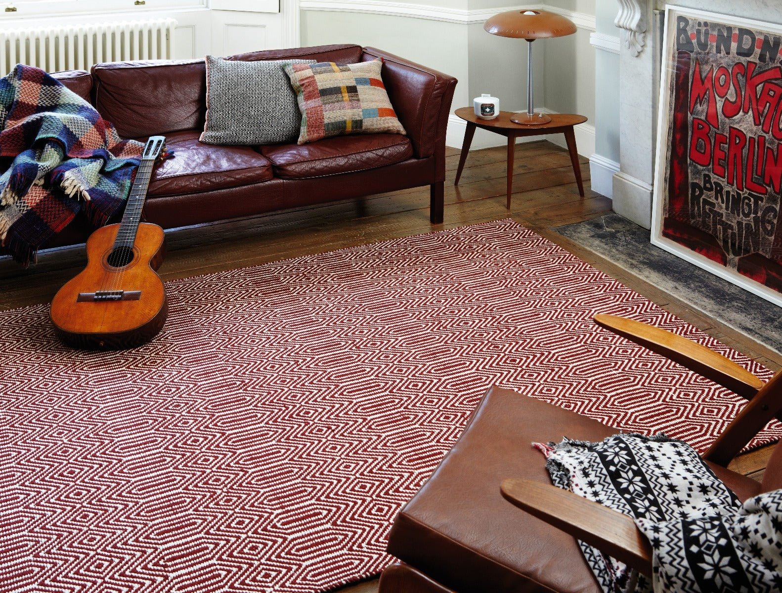 red and white woven rug with aztec chevron pattern