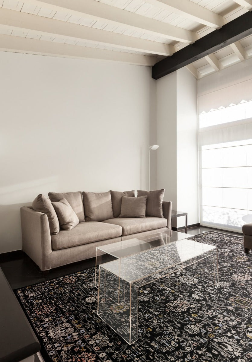 Vintage style rug in distressed black floral print