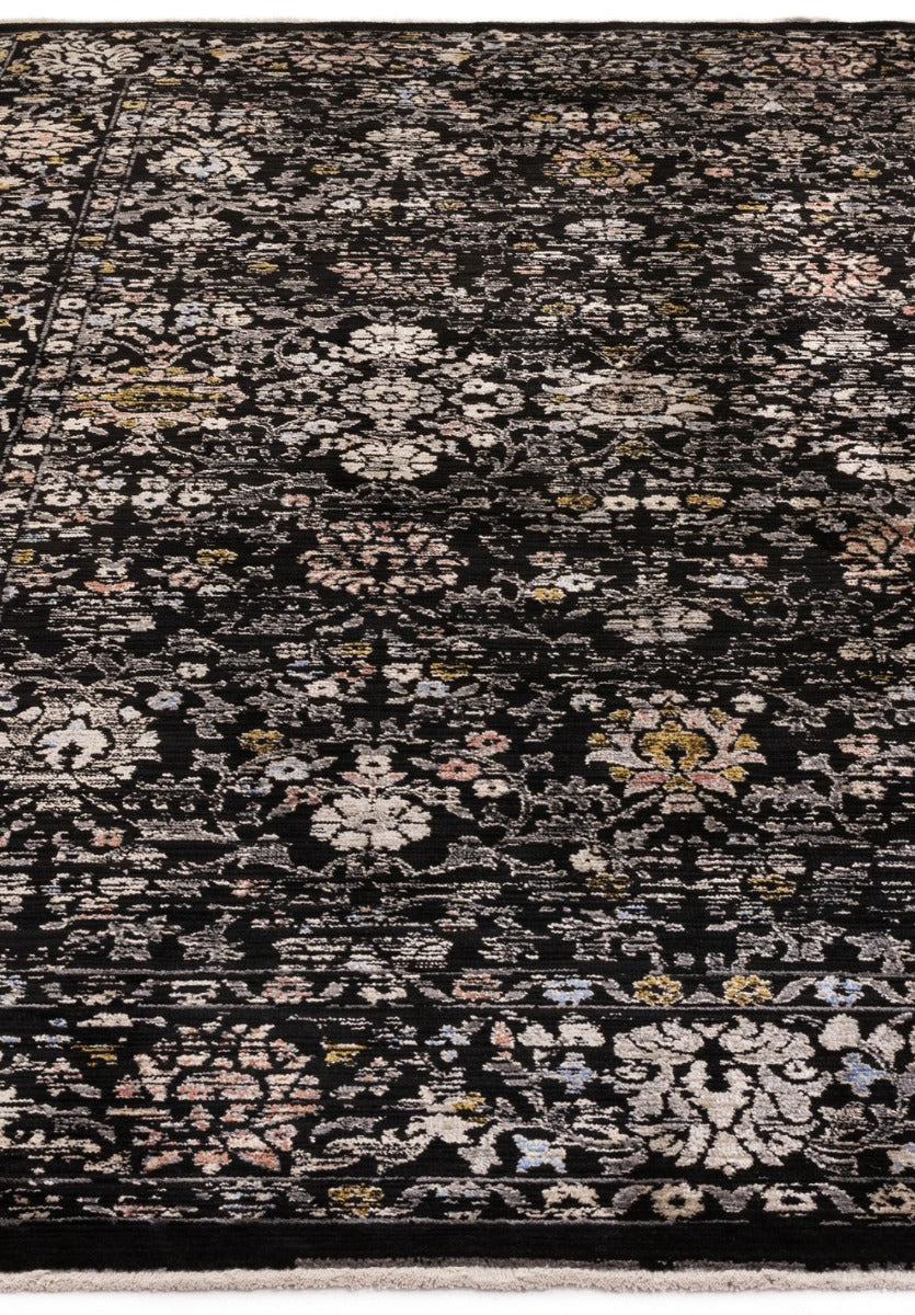 Vintage style rug in distressed black floral print