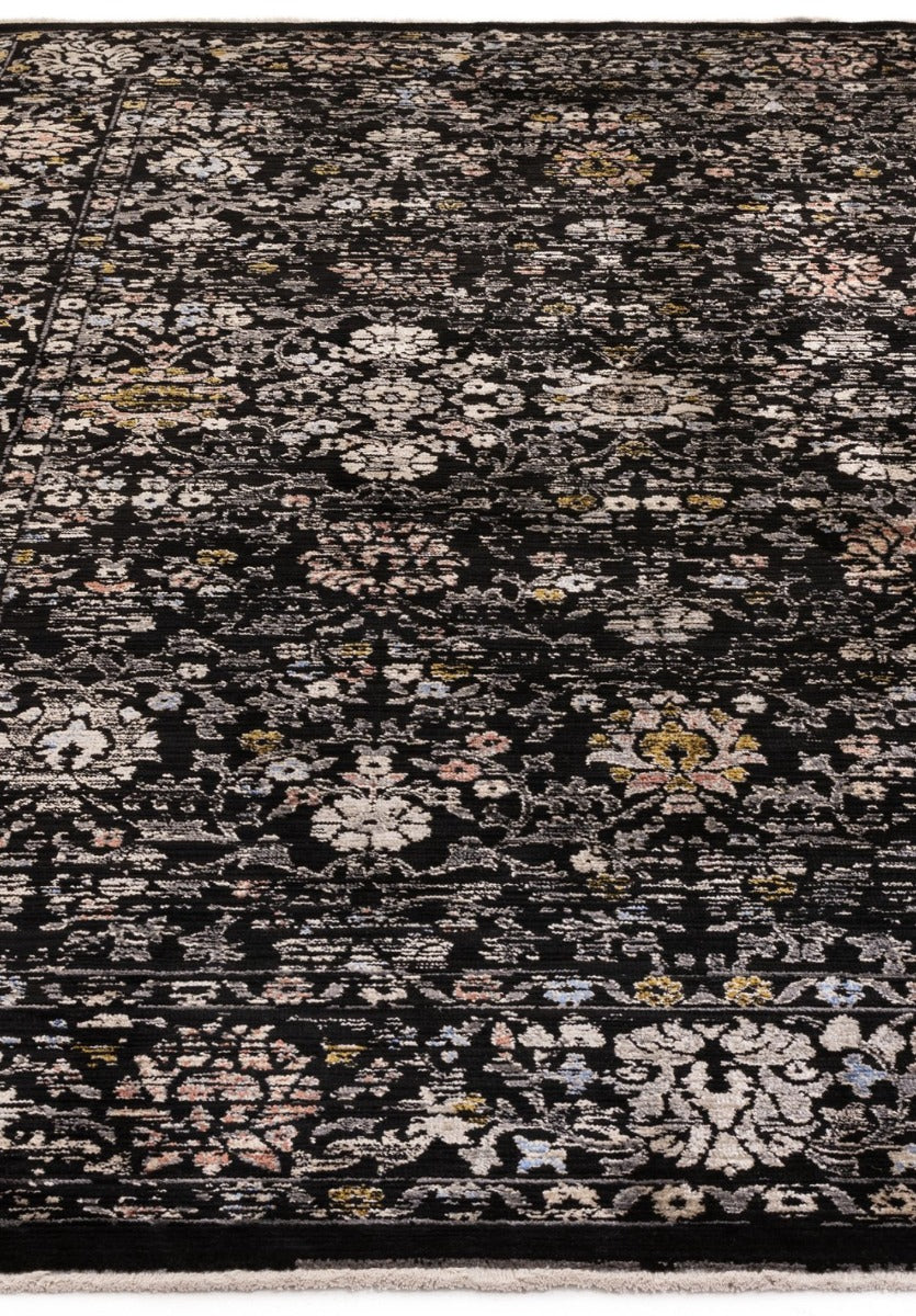 Vintage style rug in distressed black floral print
