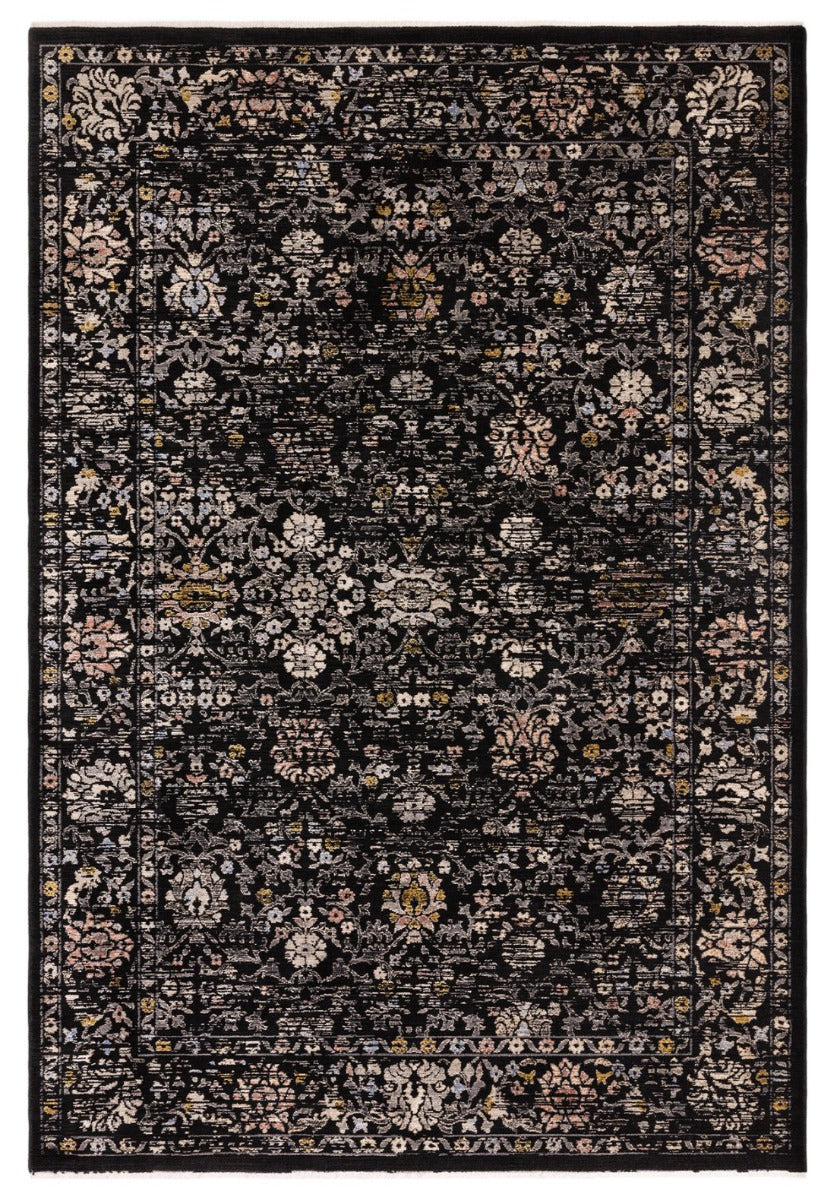 Vintage style rug in distressed black floral print