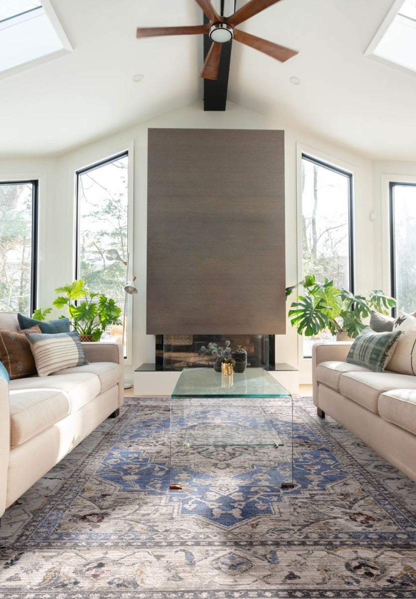 Vintage style distressed rug in shades of blue and beige