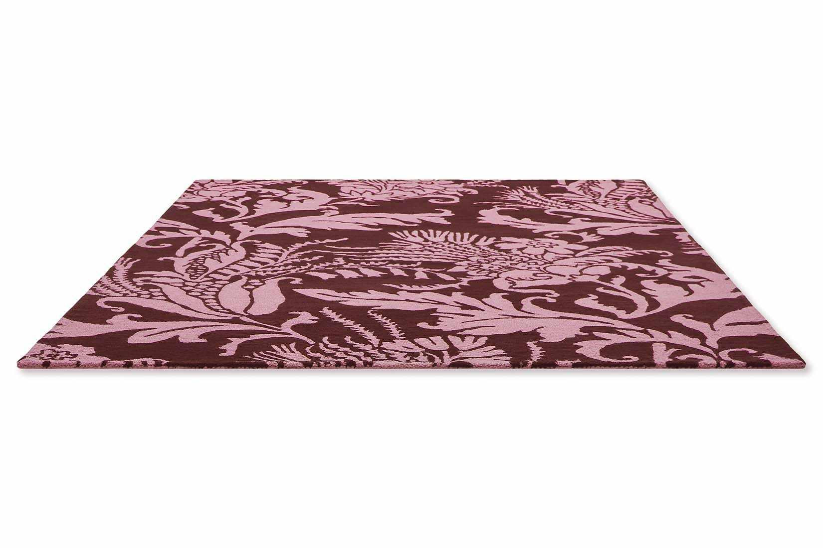red wool rug with pink flowers