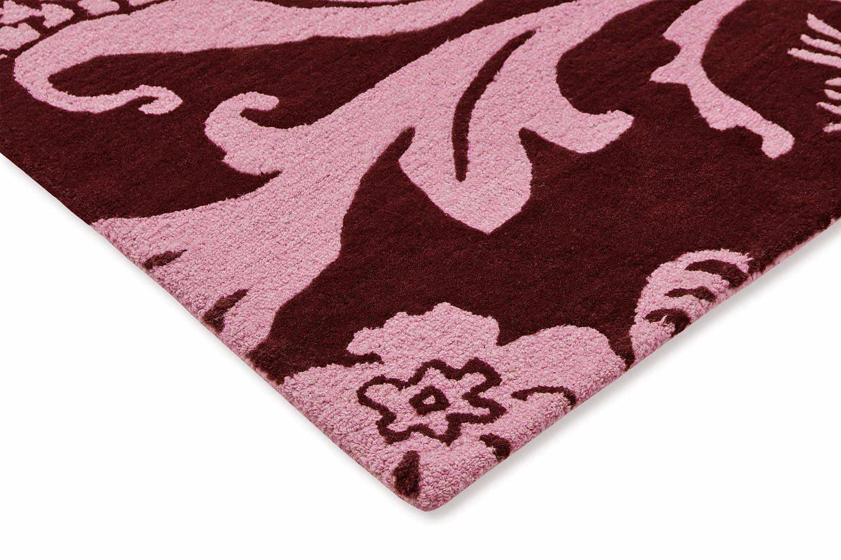 red wool rug with pink flowers