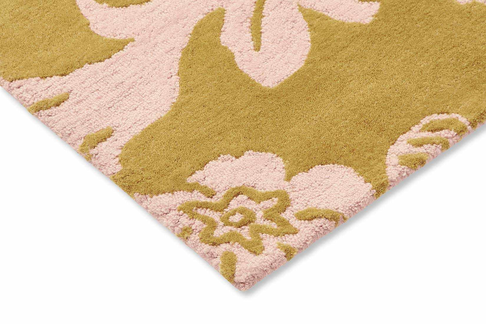 yellow wool rug with pink flowers