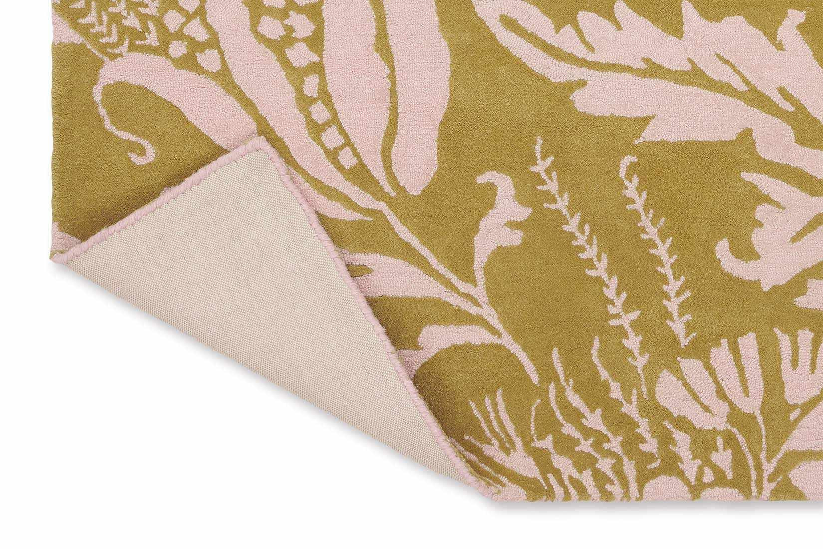 yellow wool rug with pink flowers