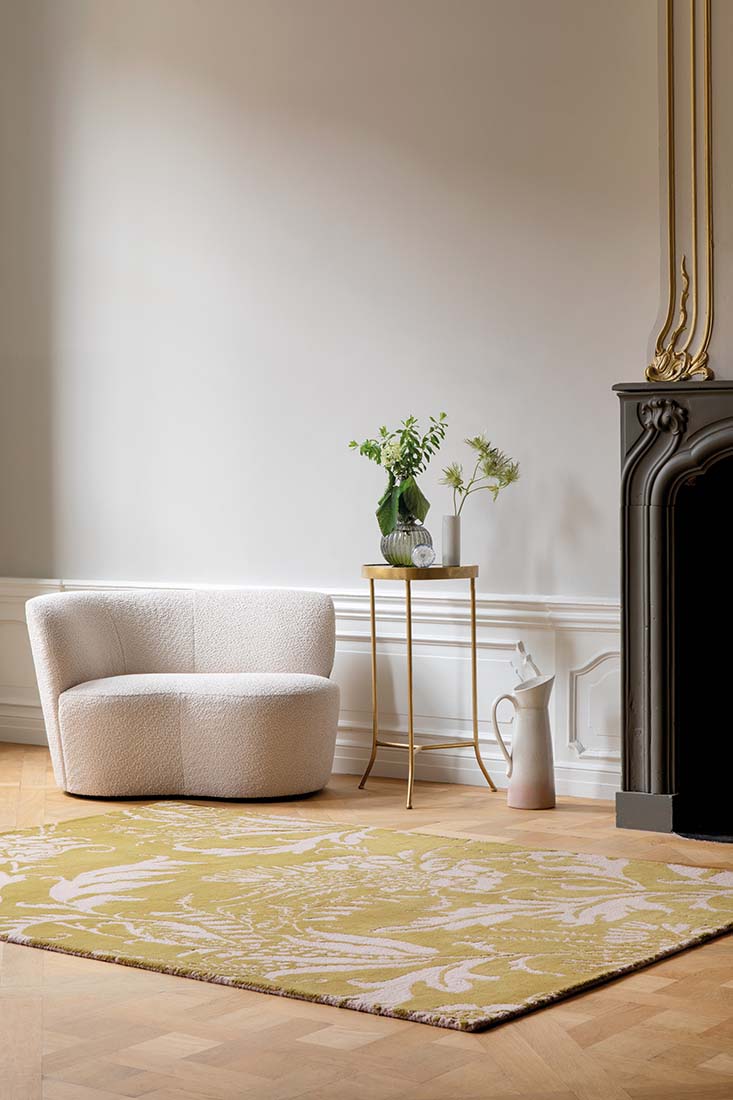 yellow wool rug with pink flowers