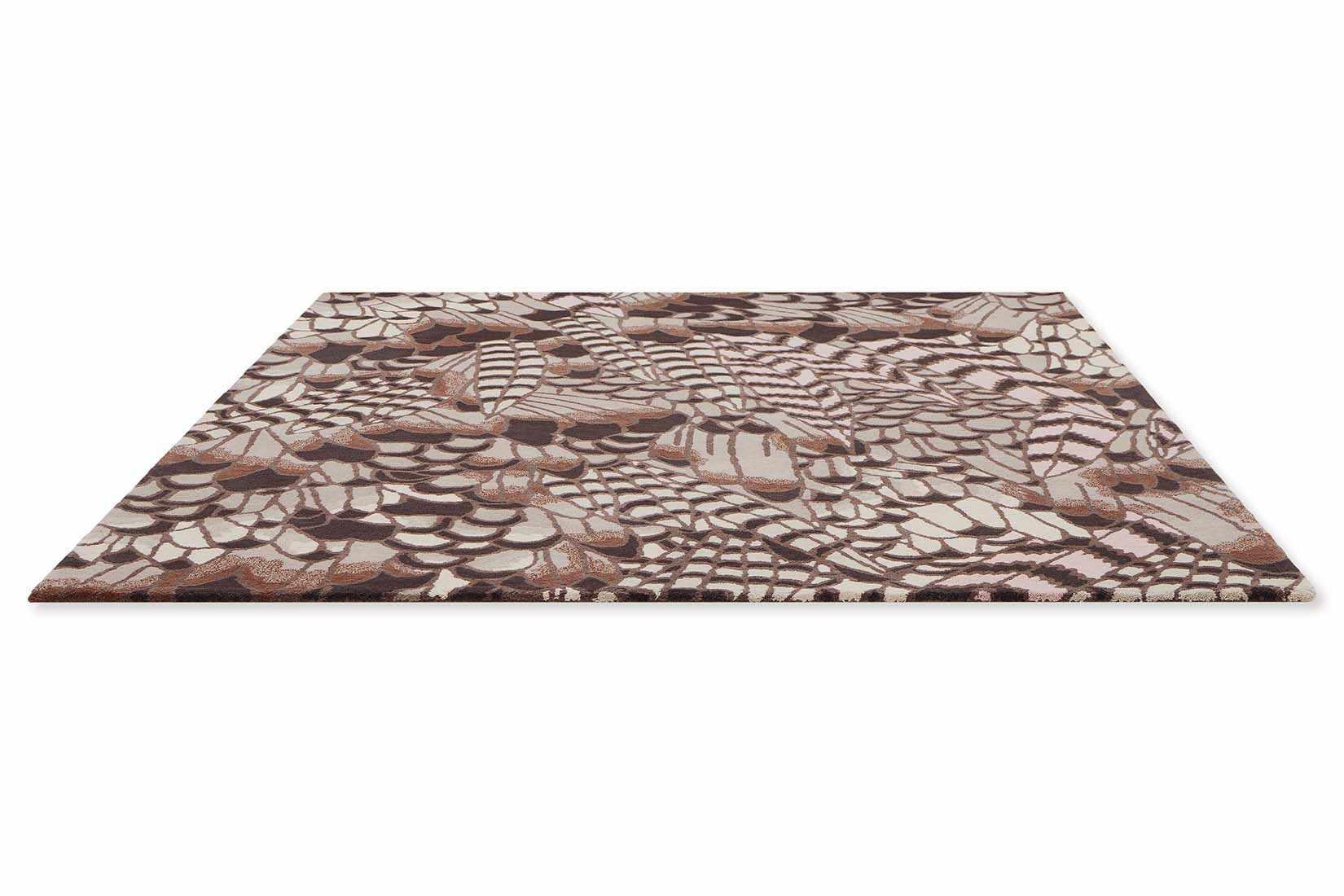 brown wool rug with feather pattern