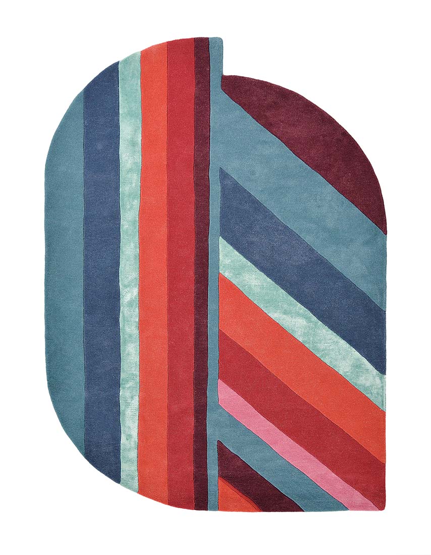 green wool rug with astract design