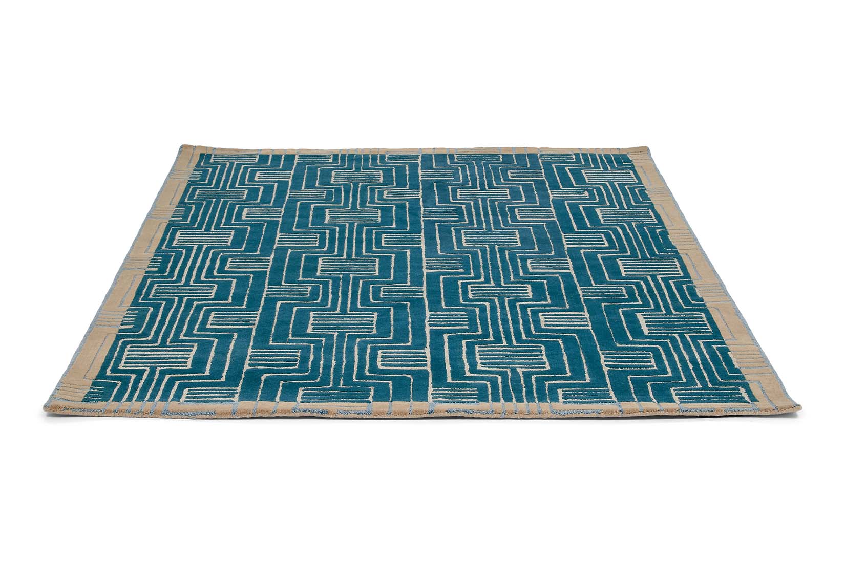 Rectangular green rug with beige border and grey art deco pattern