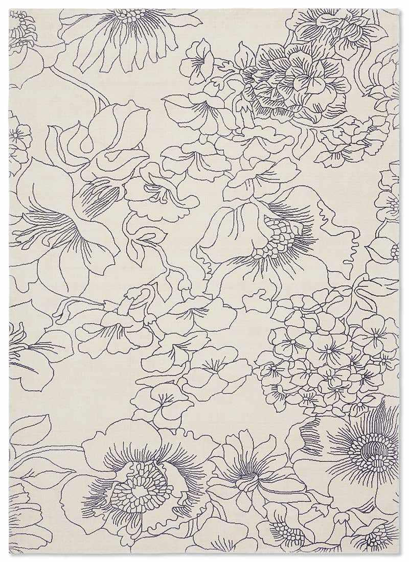 cream cotton rug with floral pattern in blue