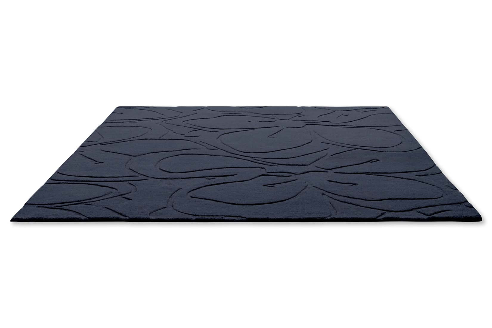 blue wool rug with floral shapes