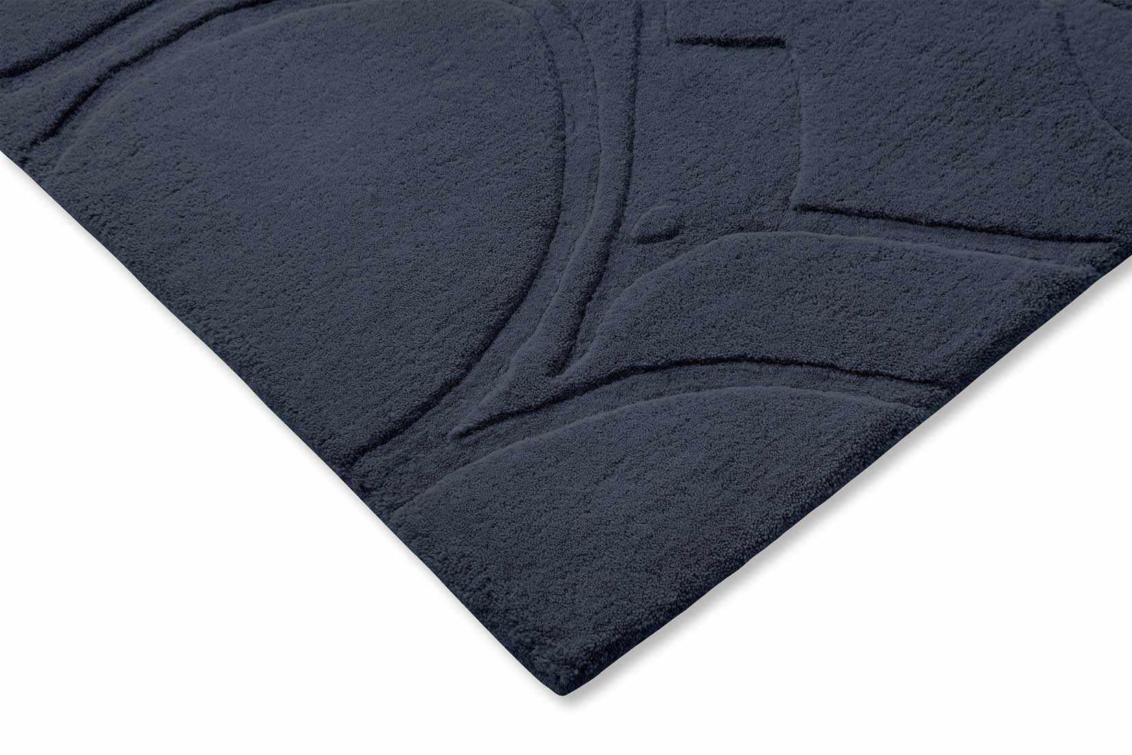blue wool rug with floral shapes