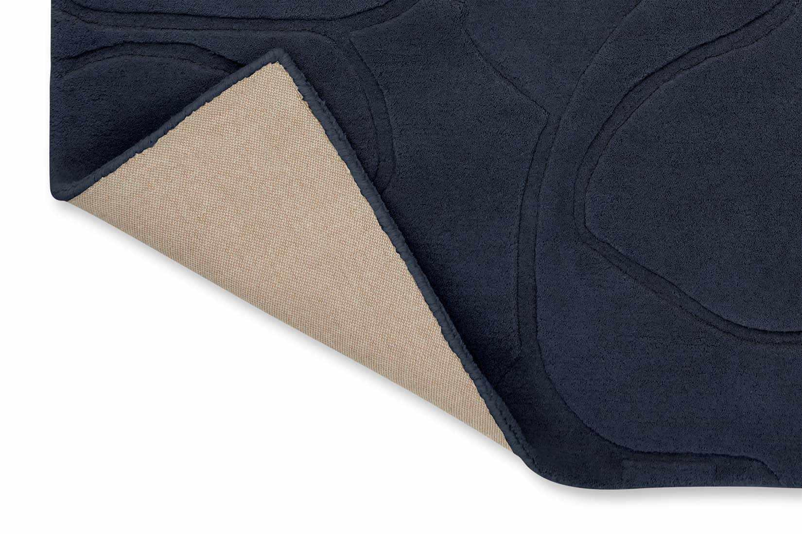 blue wool rug with floral shapes