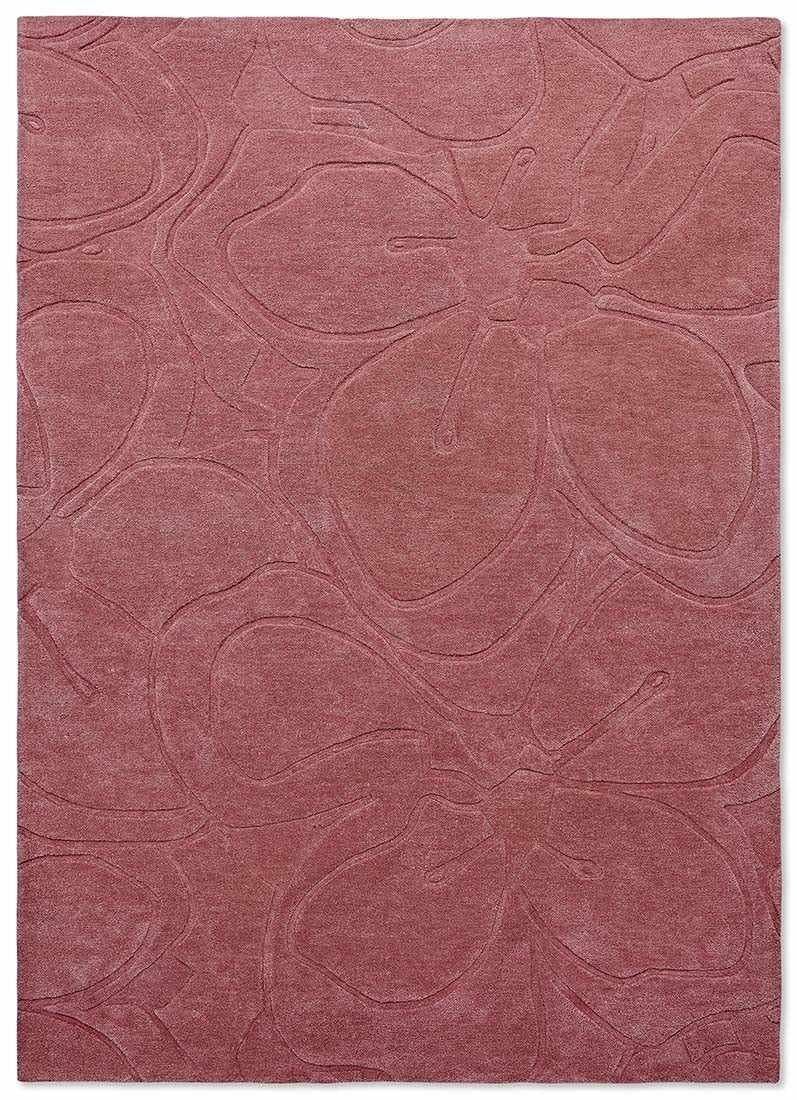 pink wool rug with floral shapes