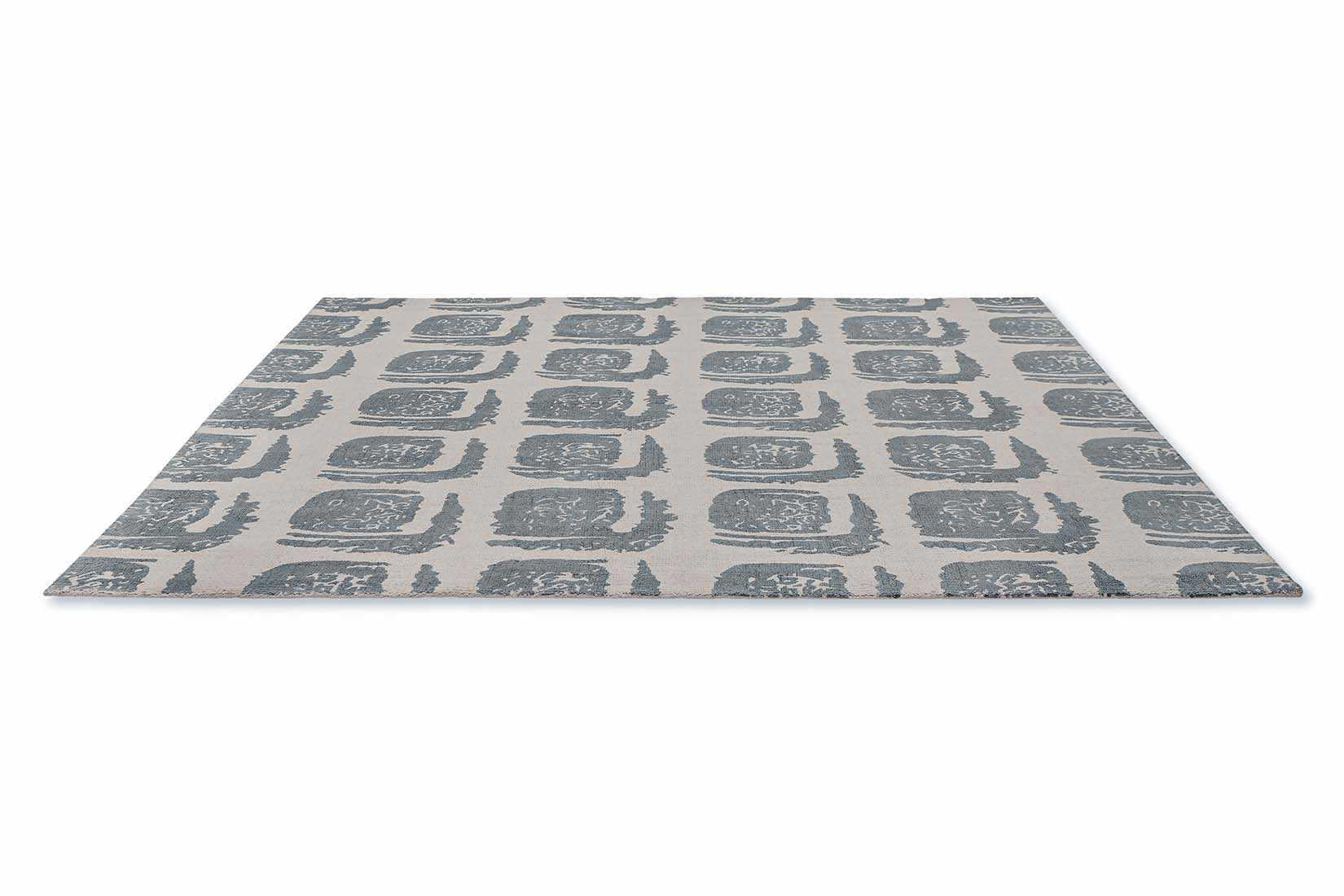 grey cotton rug with abstract blue squares