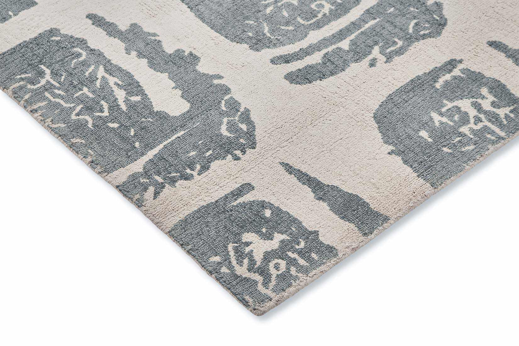 grey cotton rug with abstract blue squares