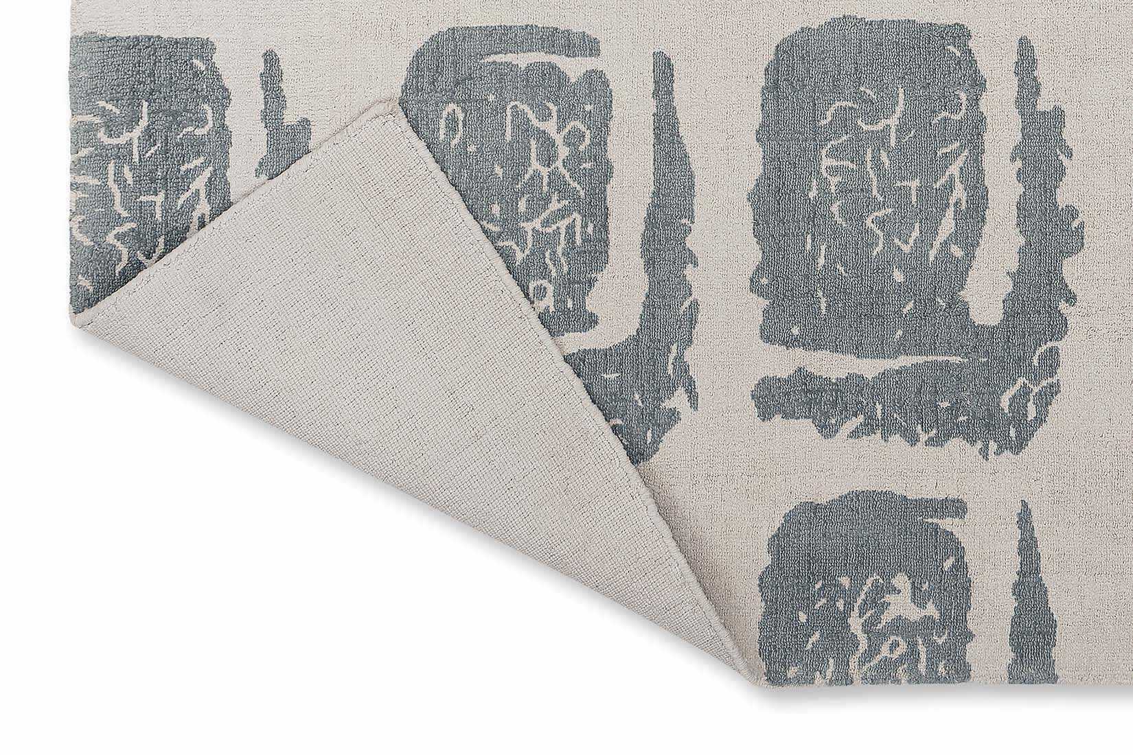 grey cotton rug with abstract blue squares