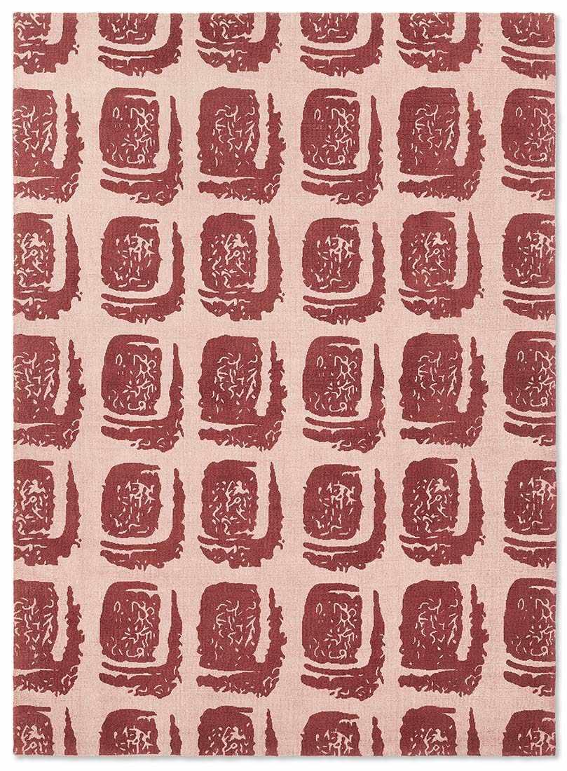 pink cotton rug with abstract red squares