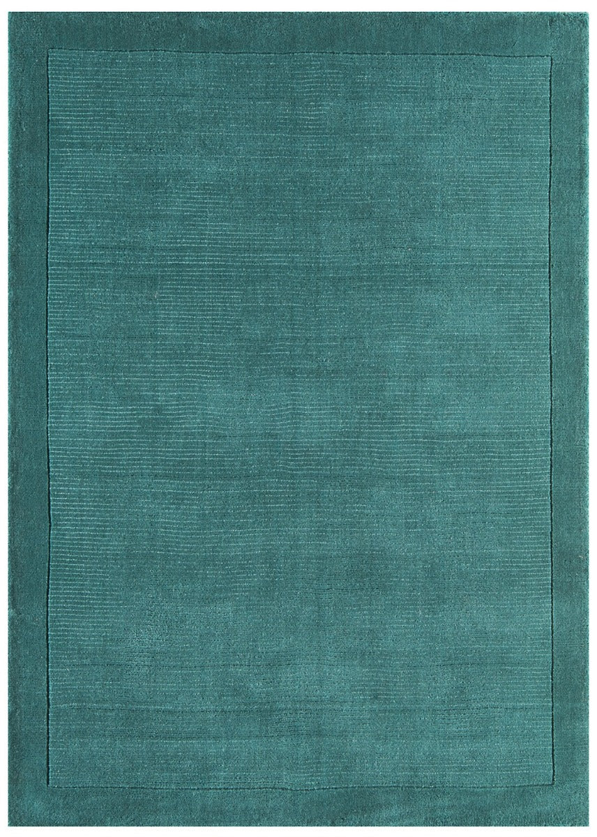 A teal blue rectangle-shaped wool rug with thin border.