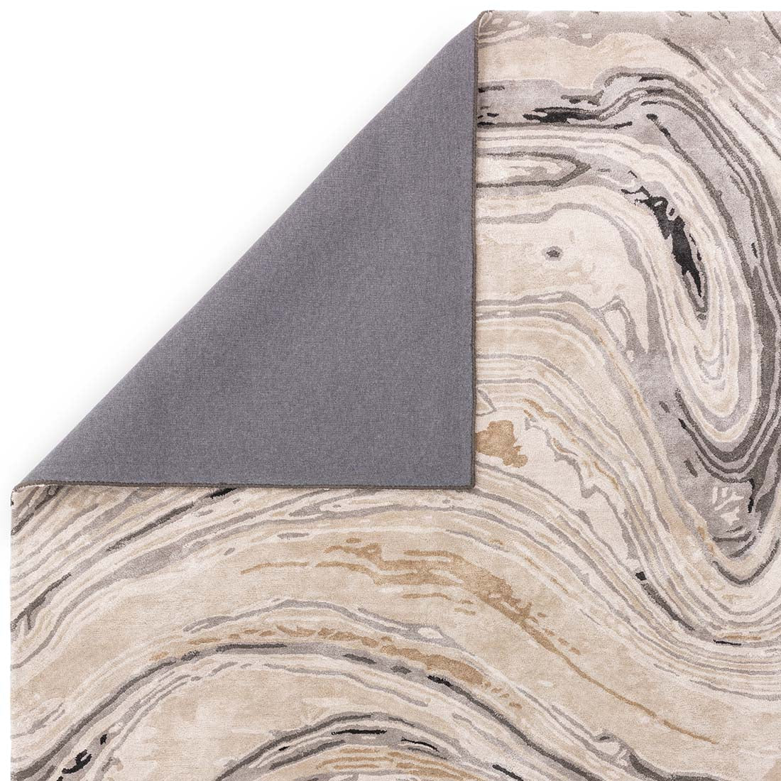shiny soft gold and beige handtufted abstract rug in a marble design