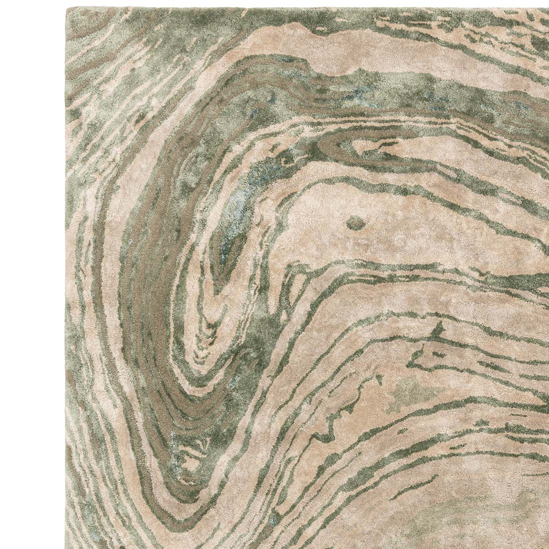 green and beige handtufted abstract rug in a marble design