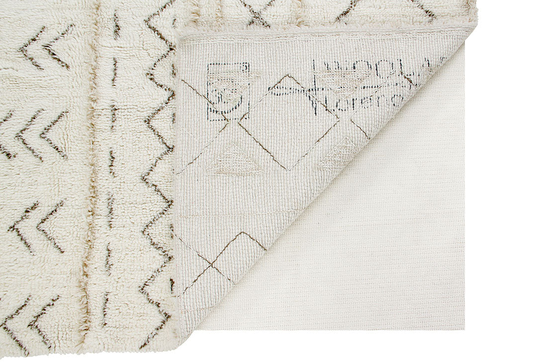 lorena canals washable wool rug with a simple moroccan beni design in beige