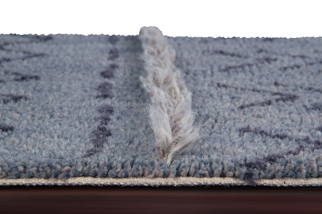 lorena canals washable wool rug with a simple moroccan beni design in blue