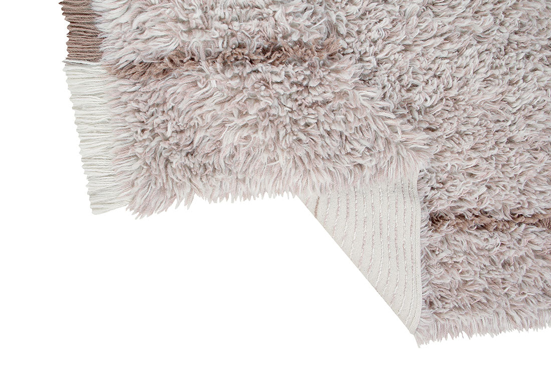 bohemian lorena canals woolable rug with a simple abstract design in beige