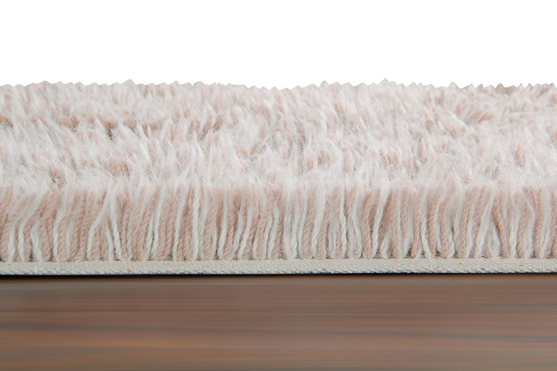 bohemian lorena canals woolable rug with a simple abstract design in beige