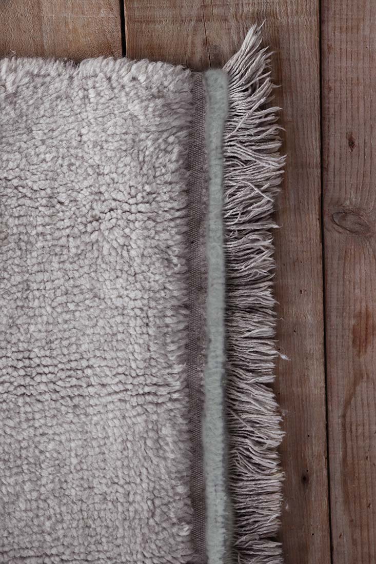 grey washable wool rug with textured detail