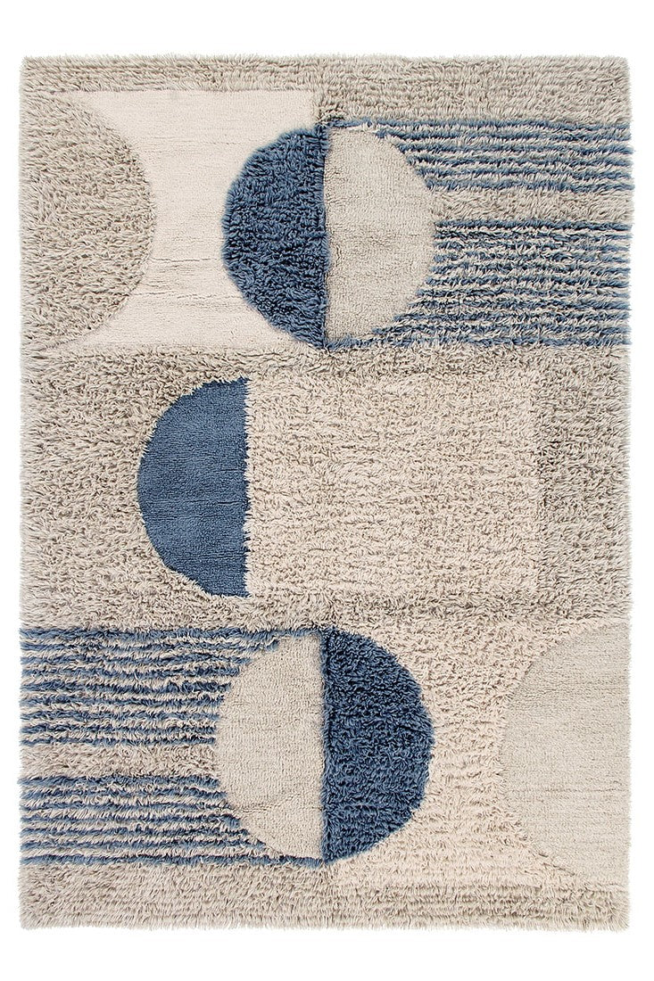 Beige and Blue Lorena Canals rug with abstract design

