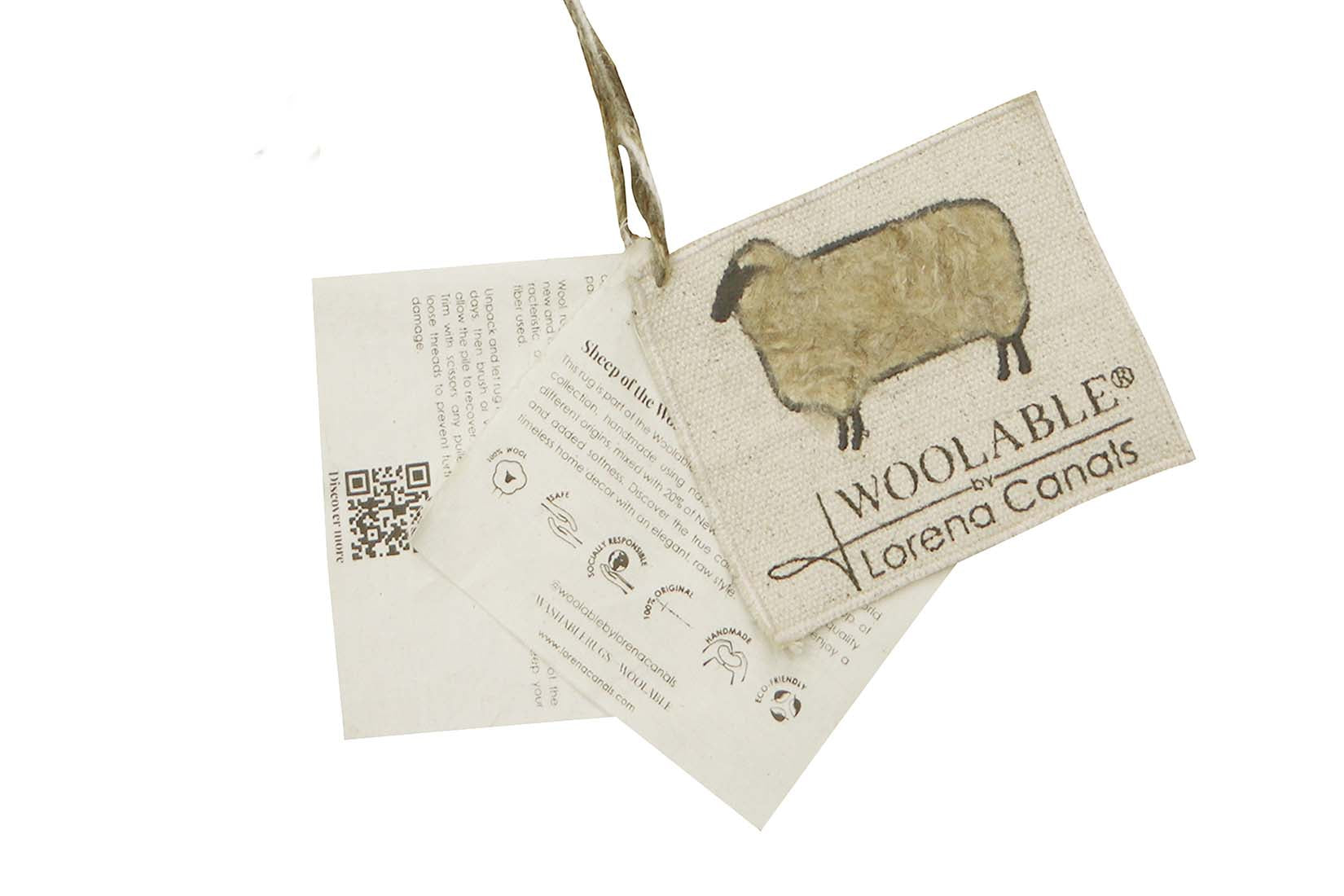 beige washable wool rug with textured detail