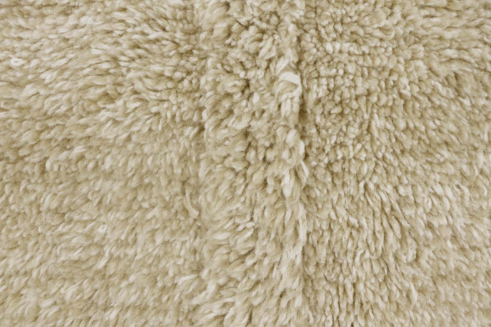 beige washable wool rug with textured detail