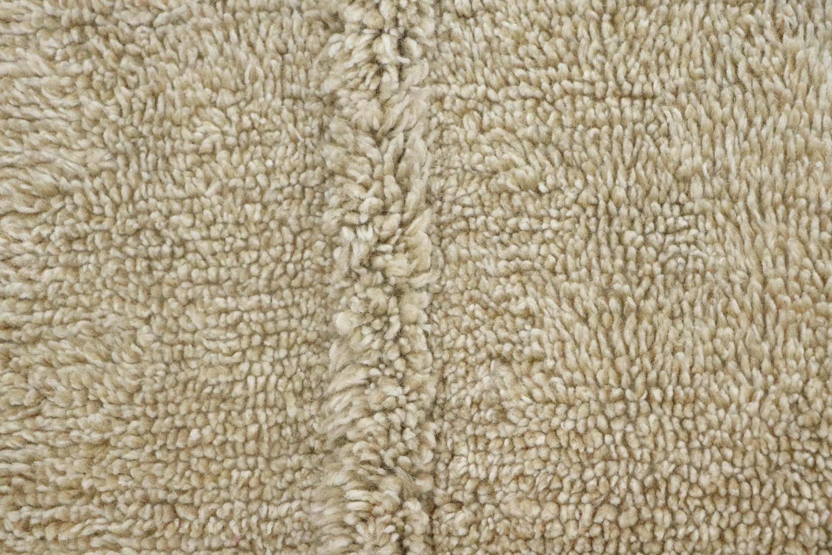 beige washable wool rug with textured detail