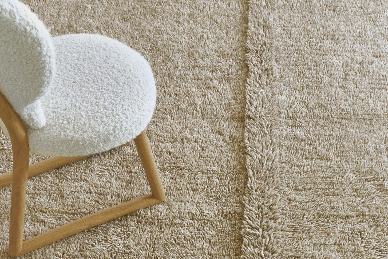beige washable wool rug with textured detail